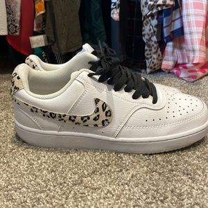 Nike with cheetah print. Like new. 7.5